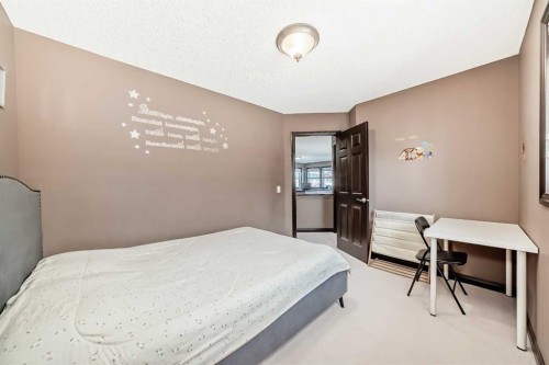 229 Panamount Road Nw, Calgary, AB - Indoor Photo Showing Bedroom