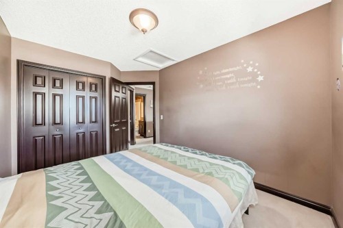 229 Panamount Road Nw, Calgary, AB - Indoor Photo Showing Bedroom