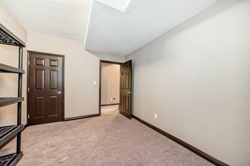 229 Panamount Road Nw, Calgary, AB - Indoor Photo Showing Other Room