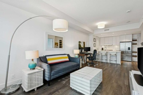 402-46 9 Street Ne, Calgary, AB - Indoor Photo Showing Living Room