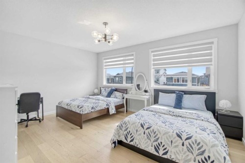 1104 Cranbrook Gardens Se, Calgary, AB - Indoor Photo Showing Bedroom