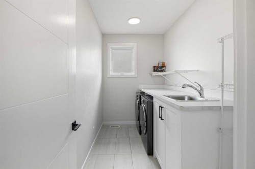 1104 Cranbrook Gardens Se, Calgary, AB - Indoor Photo Showing Laundry Room