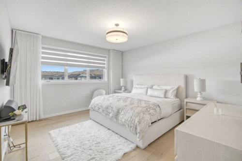 1104 Cranbrook Gardens Se, Calgary, AB - Indoor Photo Showing Bedroom