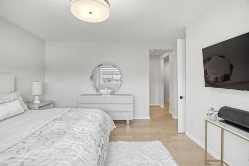 1104 Cranbrook Gardens Se, Calgary, AB - Indoor Photo Showing Bedroom
