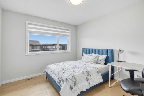 1104 Cranbrook Gardens Se, Calgary, AB - Indoor Photo Showing Bedroom