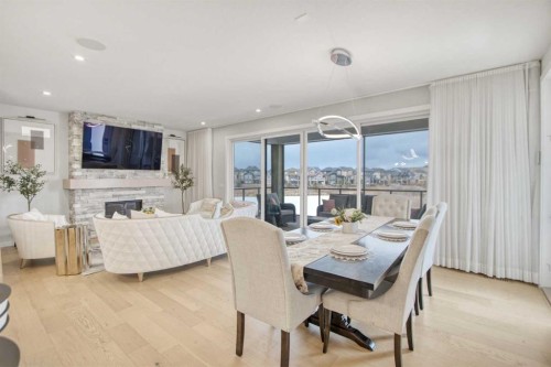 1104 Cranbrook Gardens Se, Calgary, AB - Indoor Photo Showing Other Room With Fireplace