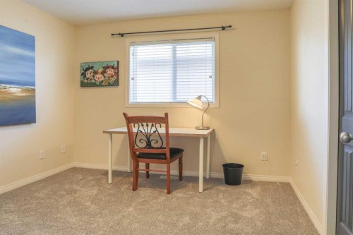 412 Highland Close, Strathmore, AB - Indoor Photo Showing Bedroom