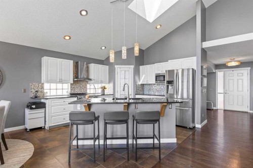 12 Arbour Estates Green Nw, Calgary, AB - Indoor Photo Showing Kitchen With Upgraded Kitchen