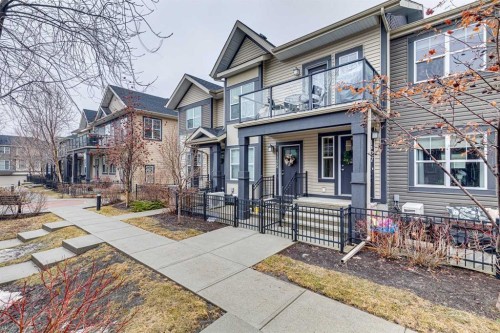 1127 Mckenzie Towne Row Se, Calgary, AB - Outdoor With Balcony With Facade