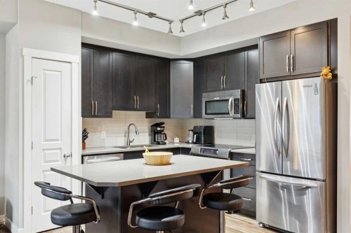 1127 Mckenzie Towne Row Se, Calgary, AB - Indoor Photo Showing Kitchen With Stainless Steel Kitchen With Upgraded Kitchen