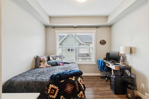 1127 Mckenzie Towne Row Se, Calgary, AB - Indoor Photo Showing Bedroom