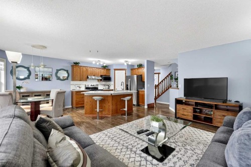 129 Bridlewood Way Sw, Calgary, AB - Indoor Photo Showing Living Room
