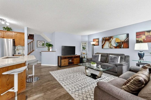 129 Bridlewood Way Sw, Calgary, AB - Indoor Photo Showing Living Room