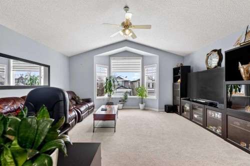 129 Bridlewood Way Sw, Calgary, AB - Indoor Photo Showing Living Room