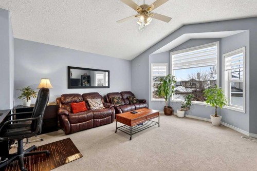 129 Bridlewood Way Sw, Calgary, AB - Indoor Photo Showing Living Room