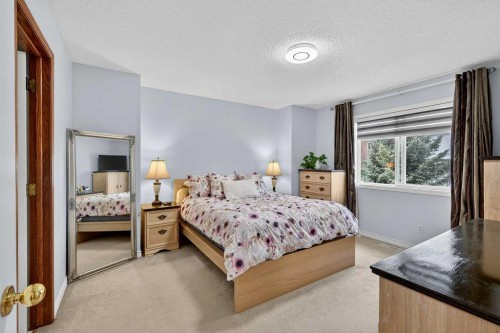 129 Bridlewood Way Sw, Calgary, AB - Indoor Photo Showing Bedroom