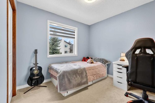 129 Bridlewood Way Sw, Calgary, AB - Indoor Photo Showing Bedroom