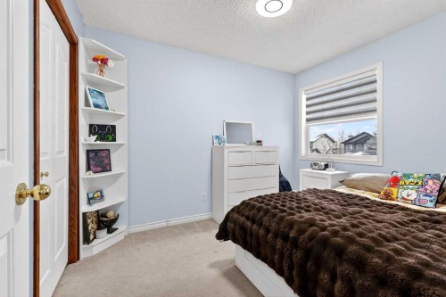129 Bridlewood Way Sw, Calgary, AB - Indoor Photo Showing Bedroom