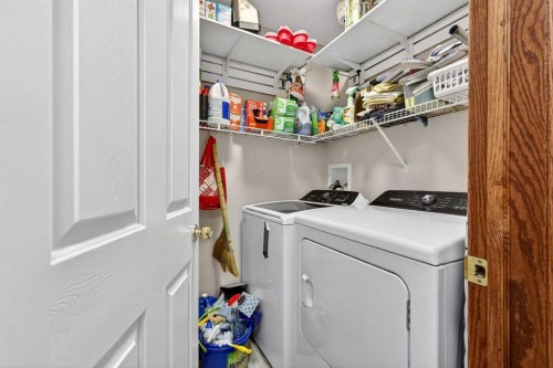129 Bridlewood Way Sw, Calgary, AB - Indoor Photo Showing Laundry Room
