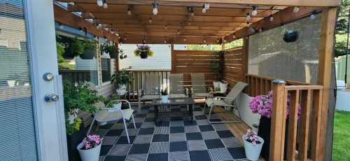 129 Bridlewood Way Sw, Calgary, AB - Outdoor With Deck Patio Veranda With Exterior