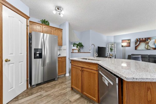 129 Bridlewood Way Sw, Calgary, AB - Indoor Photo Showing Kitchen