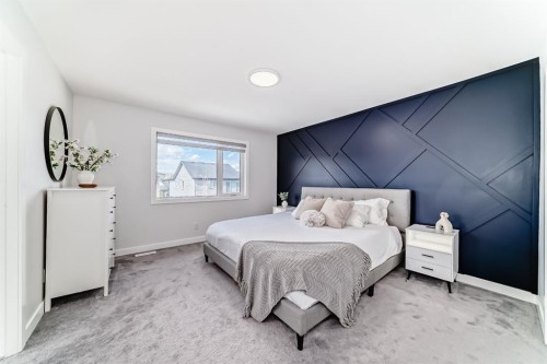 194 Willow Place, Cochrane, AB - Indoor Photo Showing Bedroom