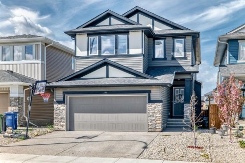 194 Willow Place, Cochrane, AB - Outdoor With Facade