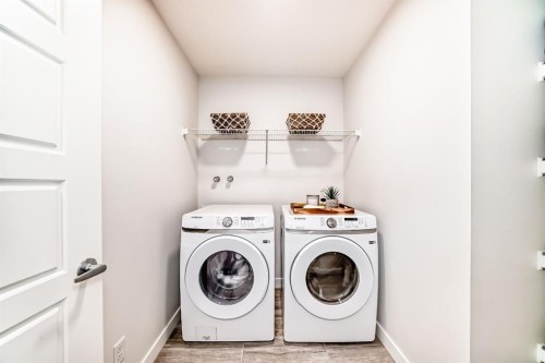 194 Willow Place, Cochrane, AB - Indoor Photo Showing Laundry Room