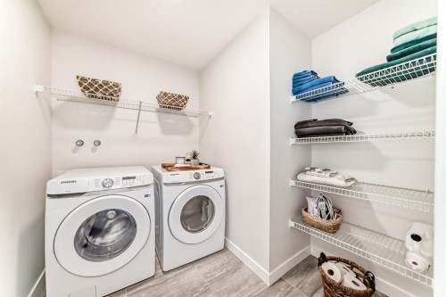 194 Willow Place, Cochrane, AB - Indoor Photo Showing Laundry Room