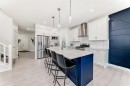 194 Willow Place, Cochrane, AB  - Indoor Photo Showing Kitchen With Stainless Steel Kitchen With Upgraded Kitchen 