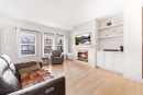 72 Evansdale Landing Nw, Calgary, AB  - Indoor Photo Showing Living Room With Fireplace 