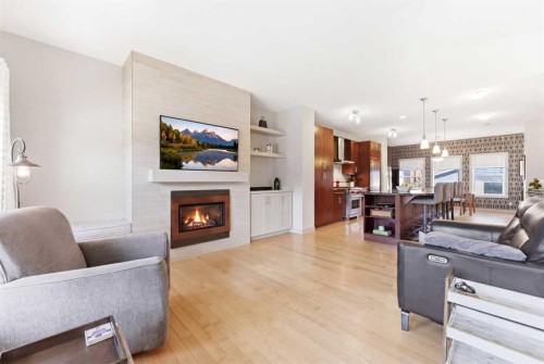 72 Evansdale Landing Nw, Calgary, AB - Indoor Photo Showing Living Room With Fireplace