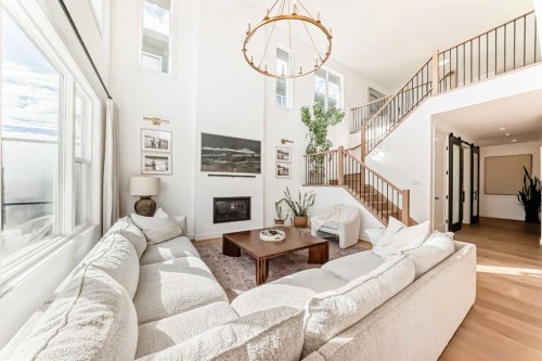 60 Cranbrook Cape Se, Calgary, AB - Indoor With Fireplace