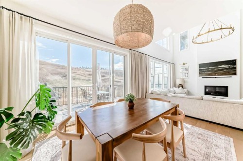 60 Cranbrook Cape Se, Calgary, AB - Indoor With Fireplace