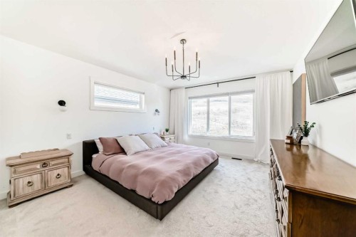 60 Cranbrook Cape Se, Calgary, AB - Indoor Photo Showing Bedroom