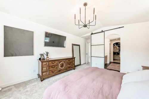 60 Cranbrook Cape Se, Calgary, AB - Indoor Photo Showing Bedroom