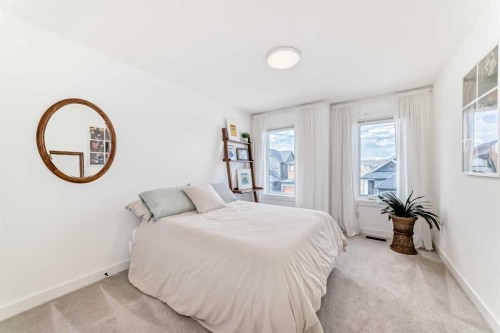 60 Cranbrook Cape Se, Calgary, AB - Indoor Photo Showing Bedroom