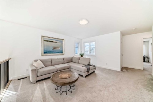 60 Cranbrook Cape Se, Calgary, AB - Indoor Photo Showing Living Room