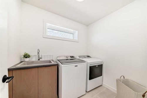 60 Cranbrook Cape Se, Calgary, AB - Indoor Photo Showing Laundry Room
