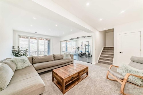 60 Cranbrook Cape Se, Calgary, AB - Indoor Photo Showing Living Room