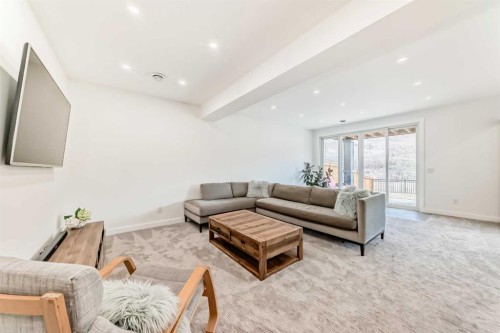 60 Cranbrook Cape Se, Calgary, AB - Indoor Photo Showing Living Room