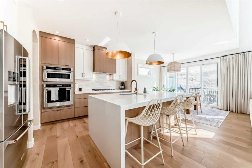 60 Cranbrook Cape Se, Calgary, AB - Indoor Photo Showing Kitchen With Upgraded Kitchen