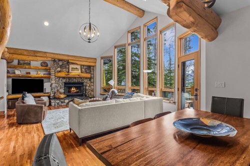 109 Silvertip Ridge, Canmore, AB - Indoor Photo Showing Other Room With Fireplace