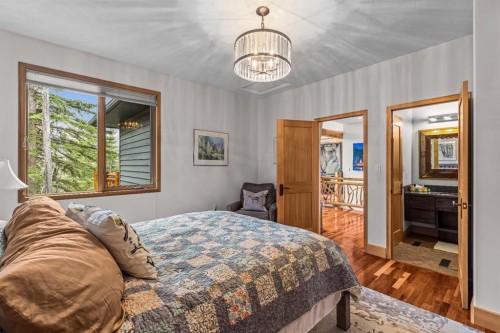 109 Silvertip Ridge, Canmore, AB - Indoor Photo Showing Bedroom