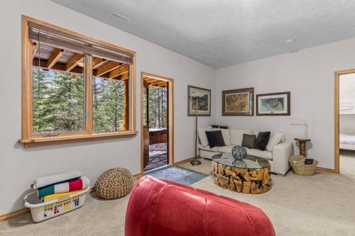 109 Silvertip Ridge, Canmore, AB - Indoor Photo Showing Bedroom