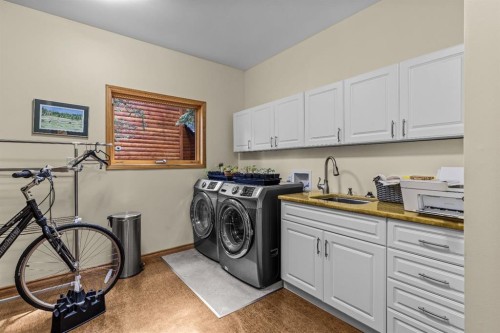 109 Silvertip Ridge, Canmore, AB - Indoor Photo Showing Laundry Room