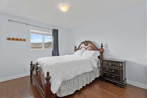113 Aspen Stone Place Sw, Calgary, AB - Indoor Photo Showing Bedroom