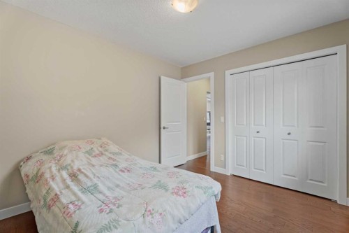 113 Aspen Stone Place Sw, Calgary, AB - Indoor Photo Showing Bedroom