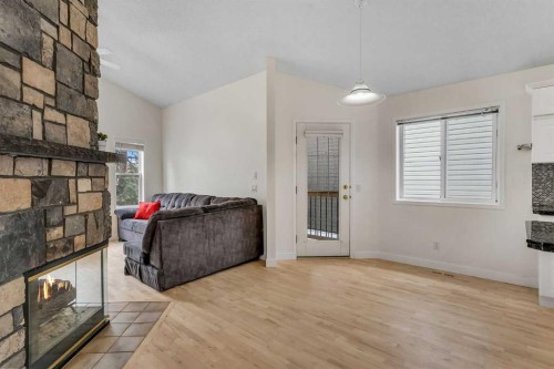 44 Douglas Glen Crescent Se, Calgary, AB - Indoor With Fireplace