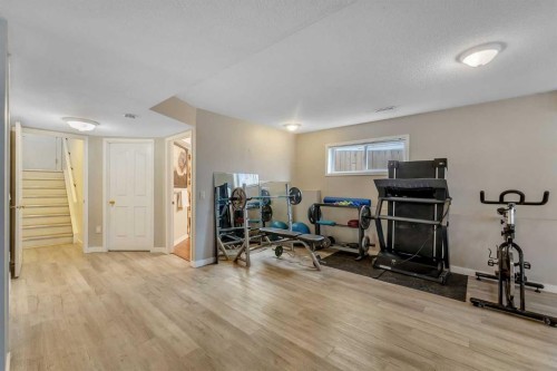 44 Douglas Glen Crescent Se, Calgary, AB - Indoor Photo Showing Gym Room